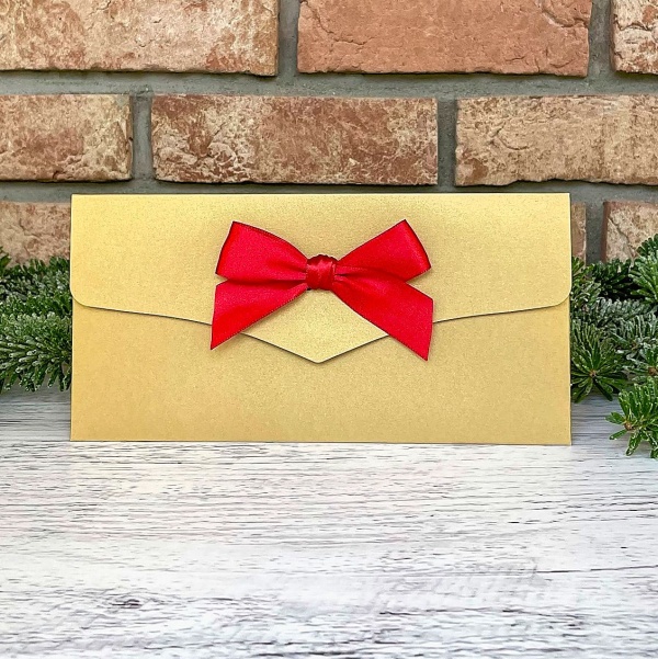 Obálka na peníze zlatá s červenou mašlí