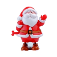 Postavička chodící Santa s cukrovinkou 15 cm